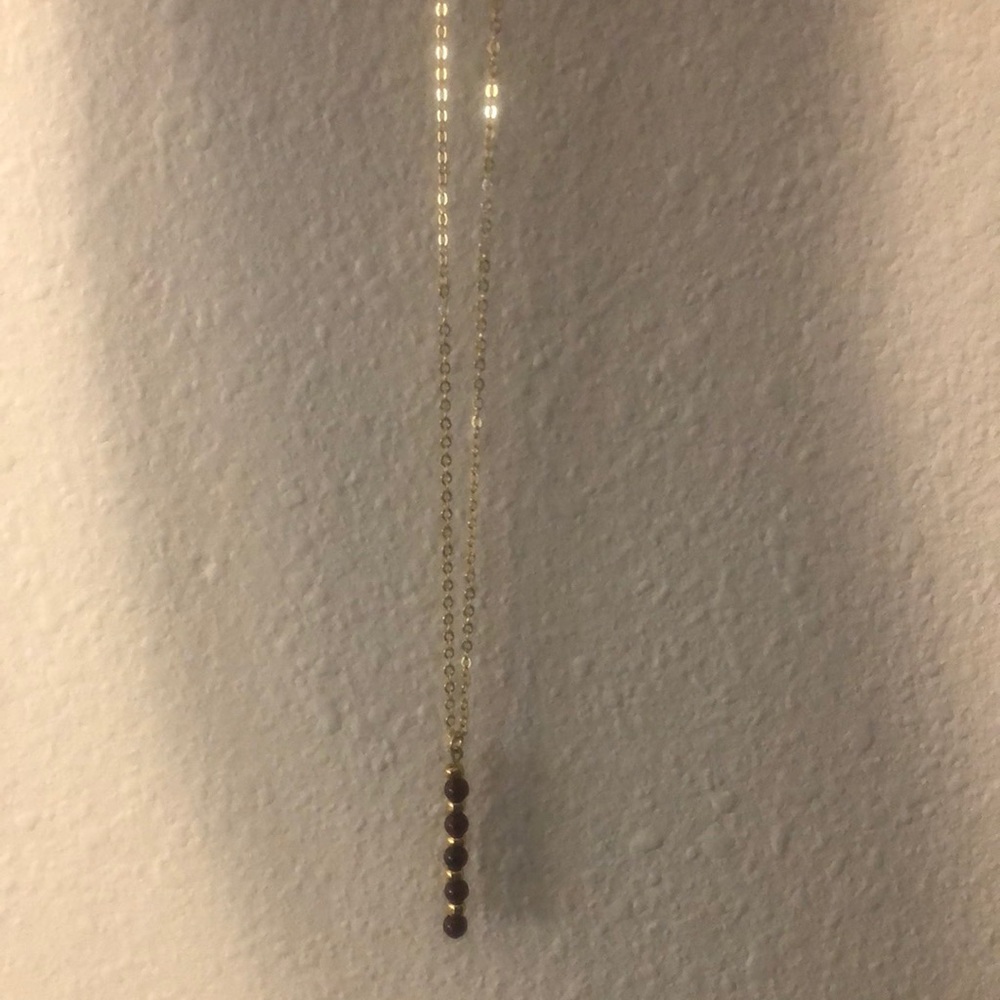 Brand new garnet and gold necklace